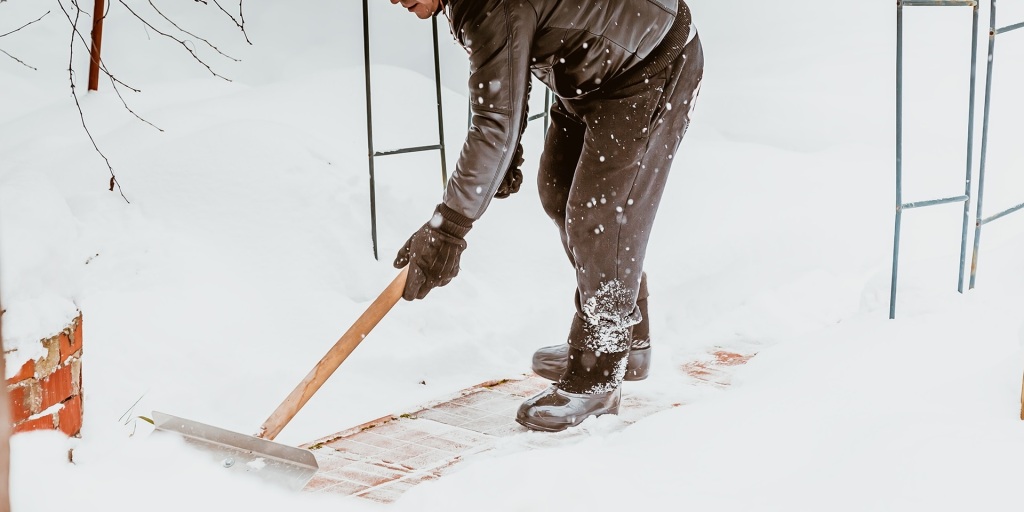 A man shovelling snow